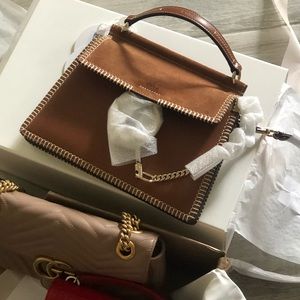 Chloe Faye bag. Gucci monogram, and Saint Laurent
